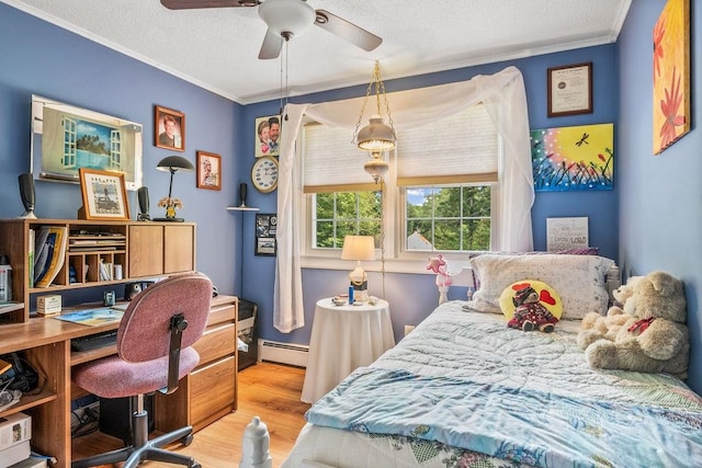 bedroom with light wood-type flooring, a textured ceiling, baseboard heating, crown molding, and ceiling fan