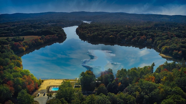 aerial view featuring a water and mountain view