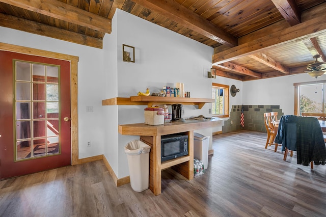 interior space featuring wooden ceiling, wood-type flooring, and plenty of natural light