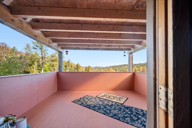 view of patio featuring a balcony