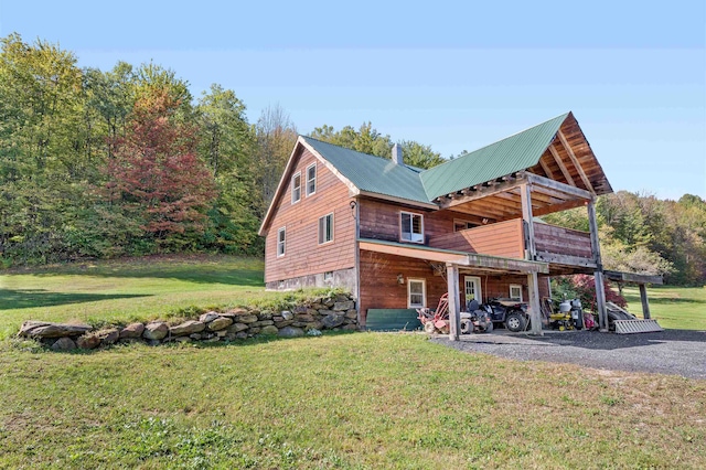 exterior space with a lawn and a patio