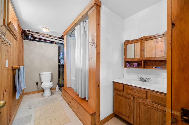 full bathroom featuring shower / tub combo, tile patterned flooring, vanity, and toilet