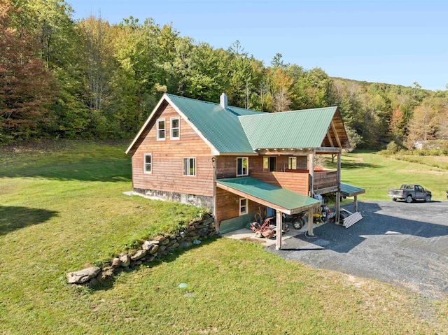 view of property exterior featuring a lawn