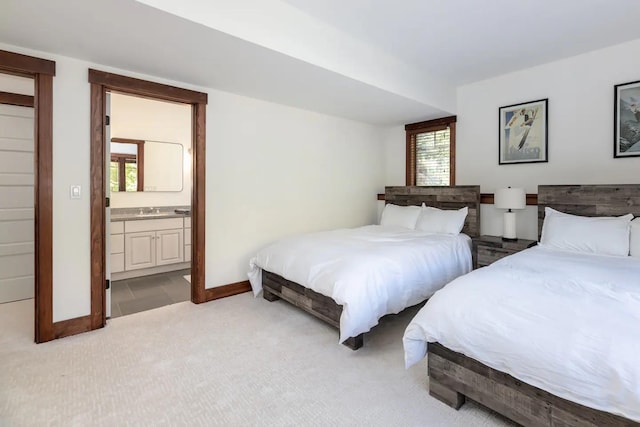 16 Crooked Mountain Rd, Lincoln, NH 03251 - bedroom with light colored carpet and ensuite bathroom