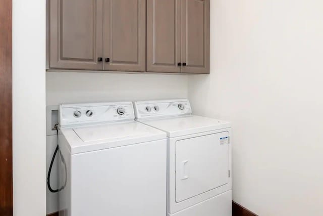 16 Crooked Mountain Rd, Lincoln, NH 03251 - washroom featuring washer and clothes dryer and cabinet space