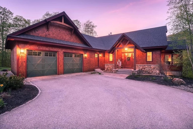 craftsman inspired home with a garage