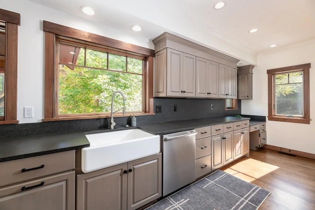 16 Crooked Mountain Rd, Lincoln, NH 03251 - kitchen with stainless steel dishwasher, dark countertops, recessed lighting, wood finished floors, and backsplash