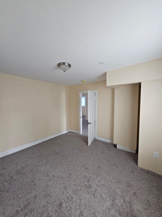 spare room with carpet flooring