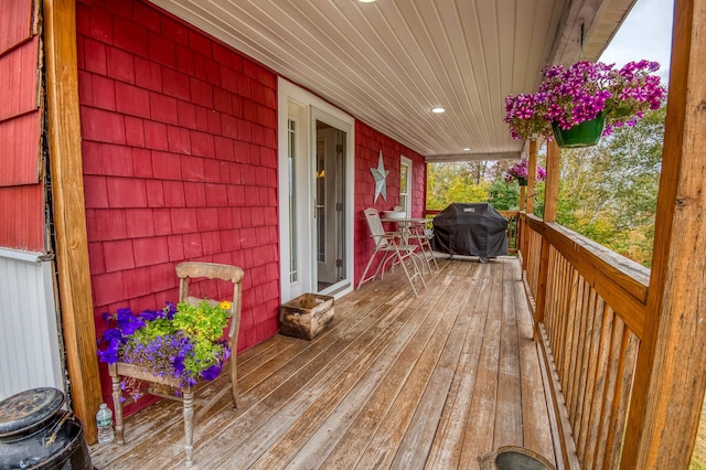 wooden deck with area for grilling