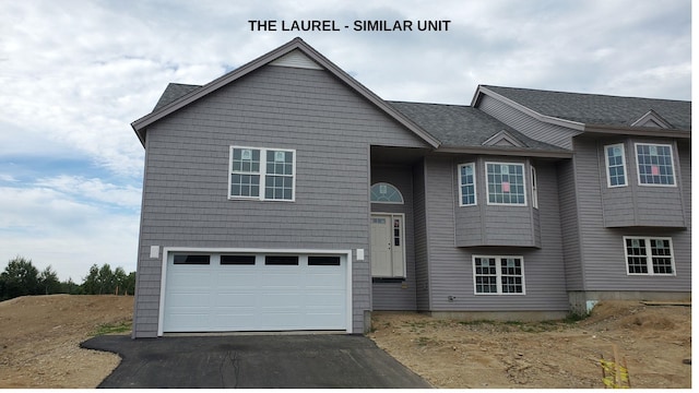 view of front of property featuring a garage