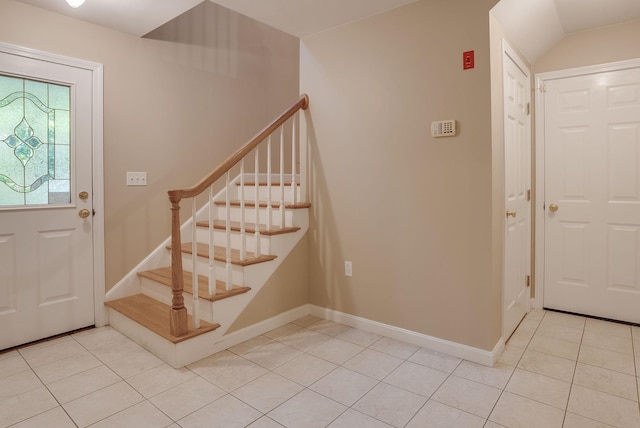 foyer featuring light tile patterned flooring