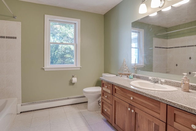 full bathroom featuring baseboard heating, tiled shower / bath combo, tile patterned floors, vanity, and toilet