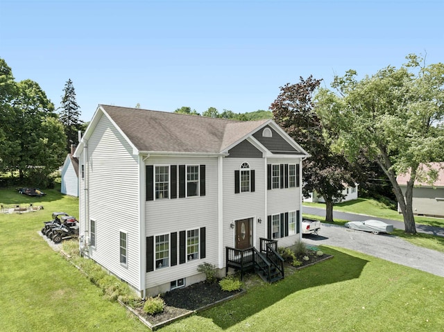 view of front of house with a front lawn