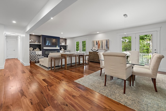 dining space featuring french doors and hardwood / wood-style floors