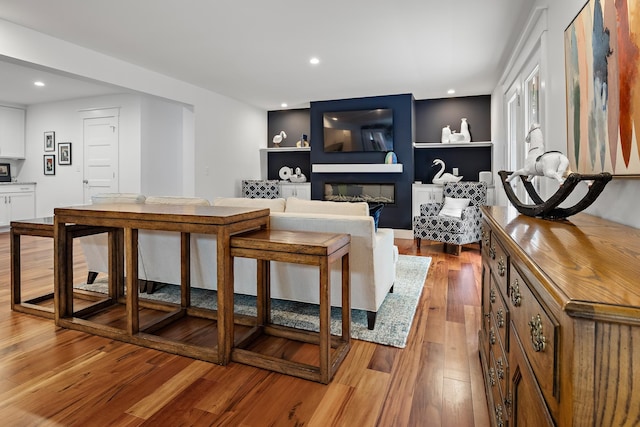 living room with light hardwood / wood-style floors