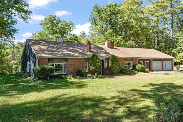 single story home featuring a front yard and a garage