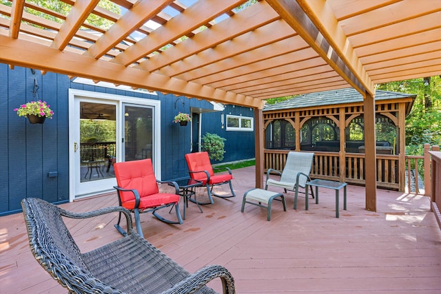 wooden deck featuring a pergola