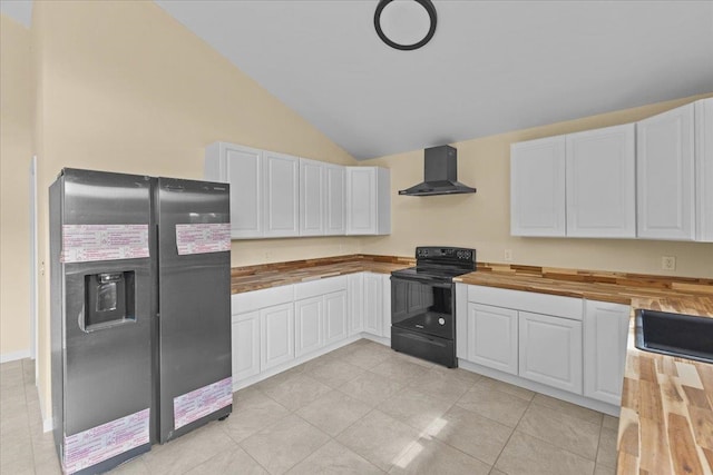 kitchen with black appliances, wall chimney range hood, and wood counters