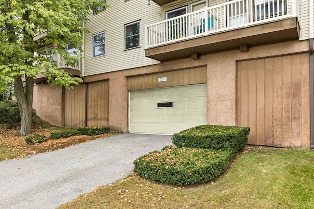 garage featuring wood walls