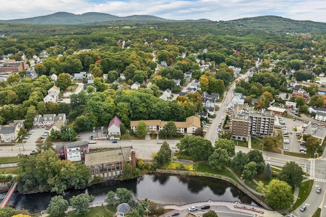 aerial view featuring a water and mountain view