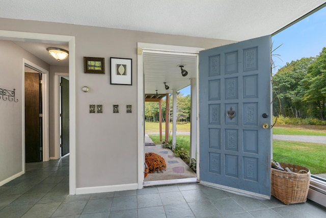 foyer entrance featuring tile patterned floors