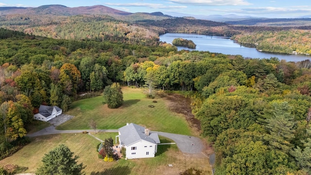 birds eye view of property featuring a water and mountain view