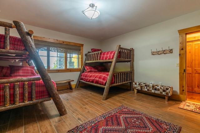 bedroom featuring hardwood / wood-style floors