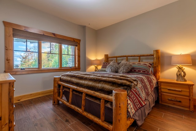 bedroom featuring dark hardwood / wood-style floors