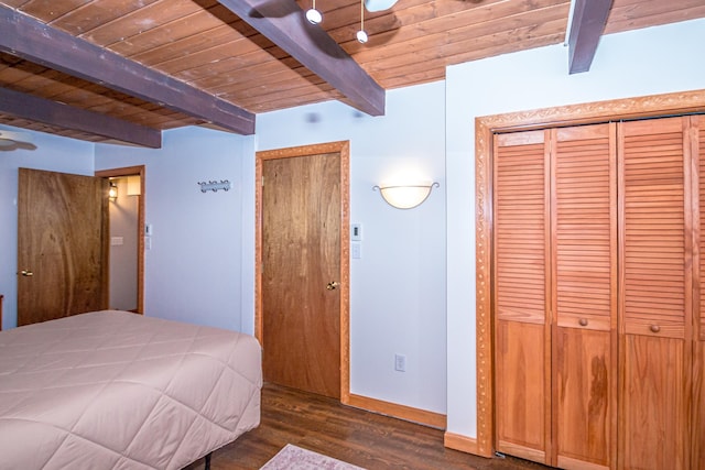 unfurnished bedroom with wooden ceiling, beam ceiling, and dark hardwood / wood-style flooring