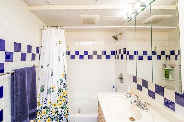 bathroom with vanity and shower / tub combo