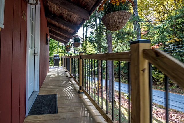 wooden balcony featuring a wooden deck