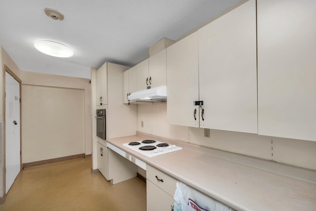 kitchen with white cabinetry, oven, and white electric stovetop