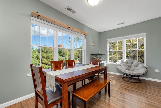 dining area featuring hardwood / wood-style flooring