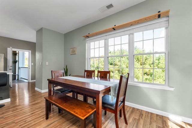 dining room featuring light hardwood / wood-style floors