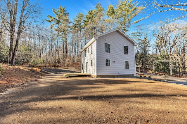 view of home's exterior with a deck