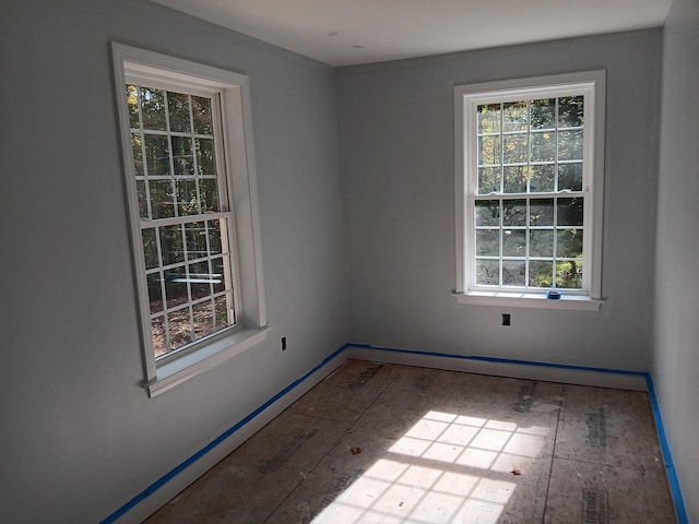 empty room featuring hardwood / wood-style floors