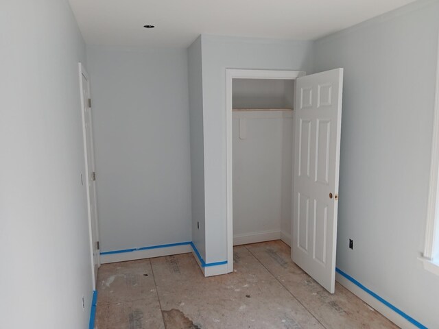 unfurnished bedroom featuring a closet