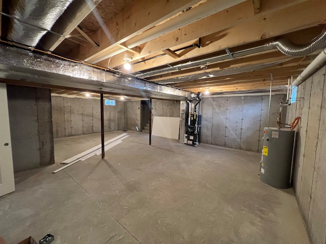 basement with heating unit and water heater