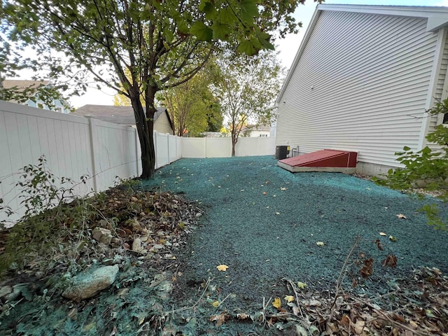 view of yard featuring central AC unit