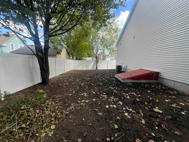 view of yard featuring central AC unit