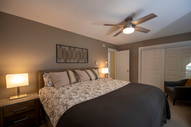 bedroom featuring carpet floors, ceiling fan, and a closet