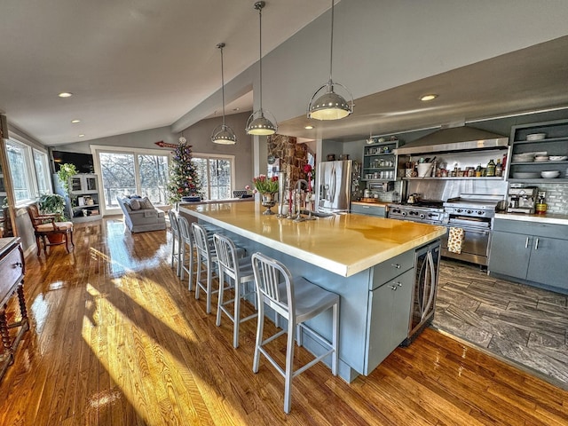 428 Pearl Lake Rd, Sugar Hill, NH 03586 - kitchen featuring gray cabinets, appliances with stainless steel finishes, dark wood-style floors, open shelves, and vaulted ceiling