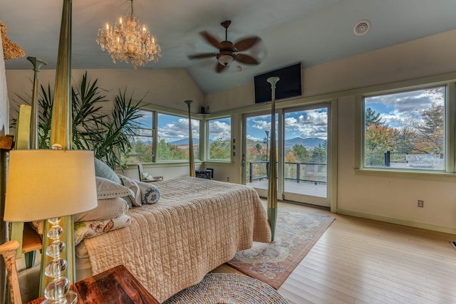 bedroom with ceiling fan with notable chandelier, access to outside, vaulted ceiling, and light hardwood / wood-style floors