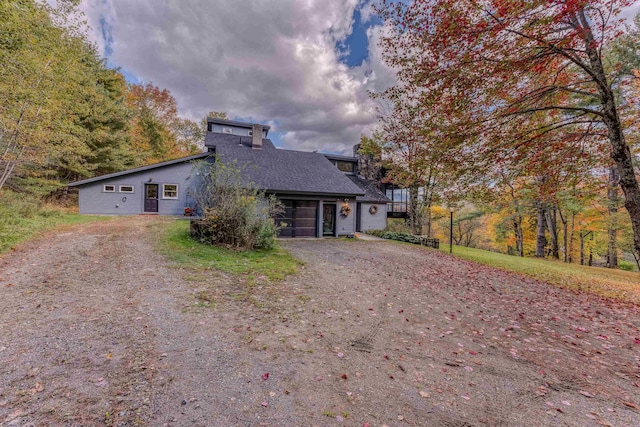 428 Pearl Lake Rd, Sugar Hill, NH 03586 - mid-century inspired home featuring driveway, a shingled roof, and a chimney
