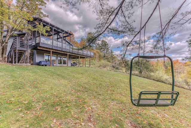 view of yard with a wooden deck