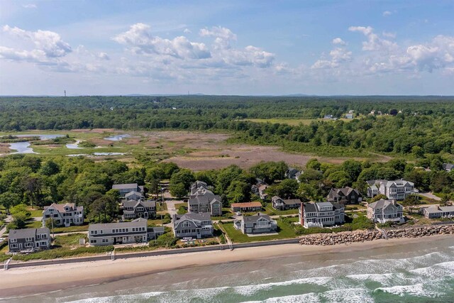 drone / aerial view with a view of the beach and a water view