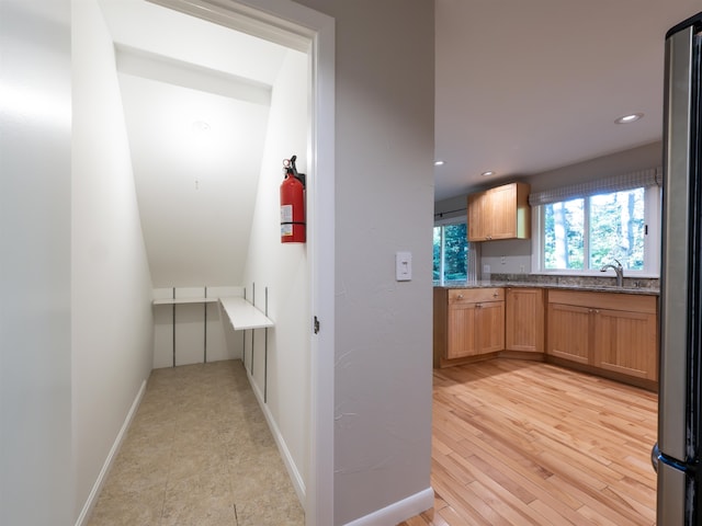 kitchen featuring light hardwood / wood-style flooring and sink