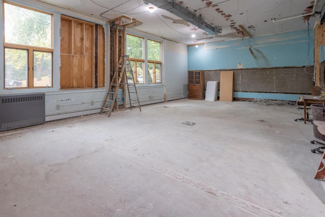 basement with radiator heating unit