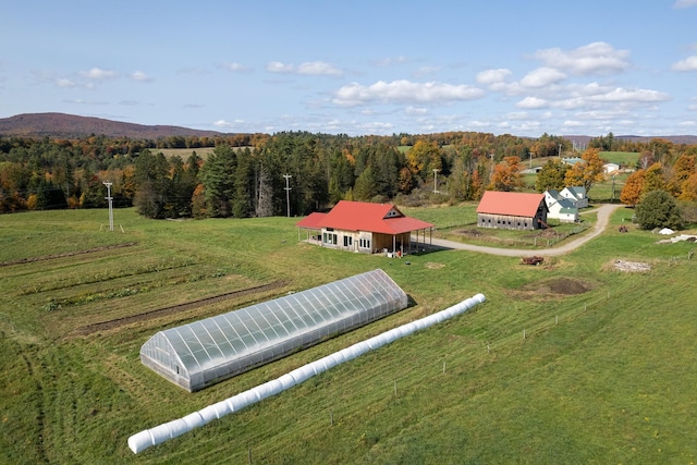 birds eye view of property featuring a rural view