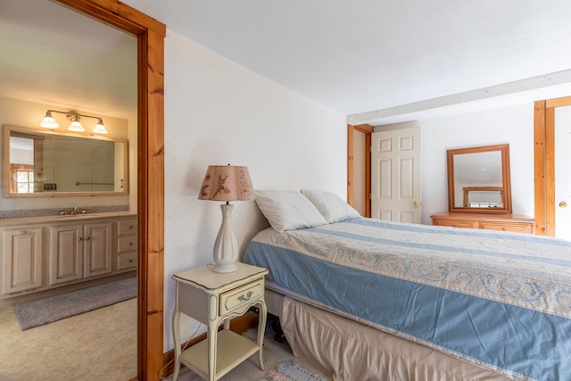 bedroom with light colored carpet